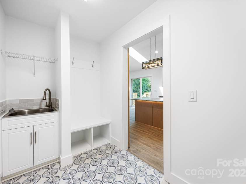 2027 Marquesas Avenue, Tega Cay, SC 29708.  MLS# CAR4262769, YatesRealty ID 28103. Laundry Room with Drop Zone off Kitchen
