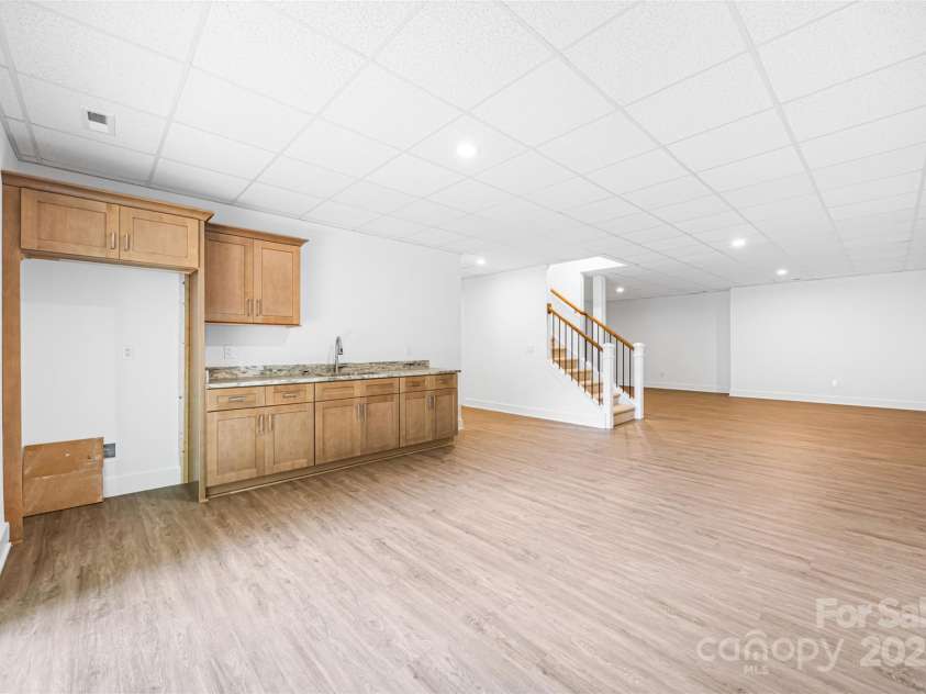 2027 Marquesas Avenue, Tega Cay, SC 29708.  MLS# CAR4262769, YatesRealty ID 28103. Lower level