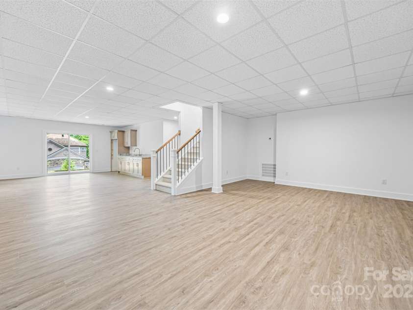 2027 Marquesas Avenue, Tega Cay, SC 29708.  MLS# CAR4262769, YatesRealty ID 28103. Lower level