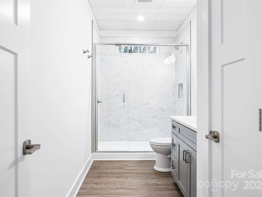 2027 Marquesas Avenue, Tega Cay, SC 29708.  MLS# CAR4262769, YatesRealty ID 28103. Lower level Full Bath