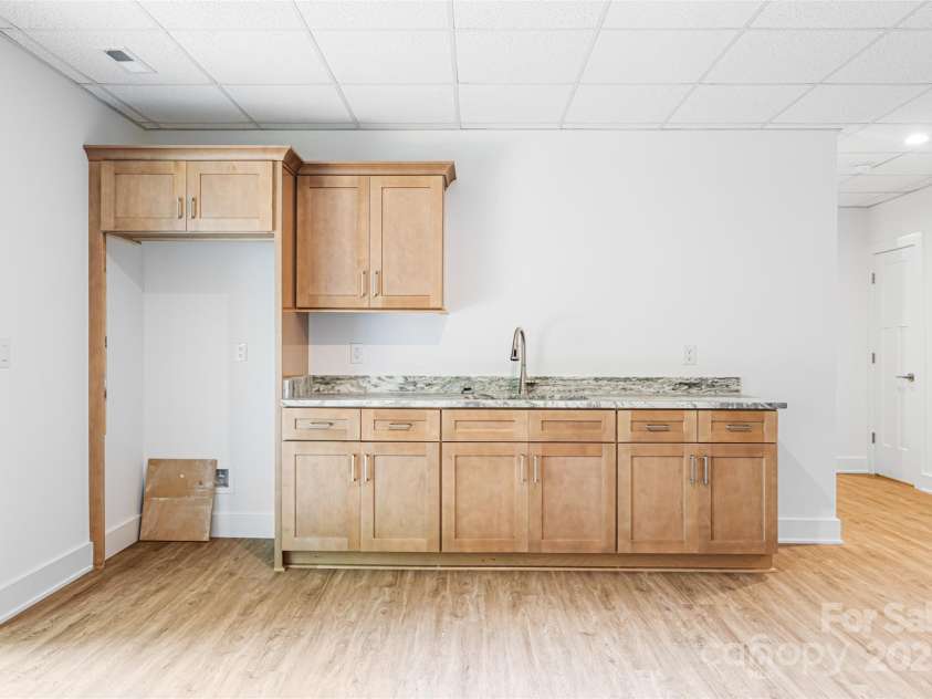 2027 Marquesas Avenue, Tega Cay, SC 29708.  MLS# CAR4262769, YatesRealty ID 28103. Lower level Wet Bar