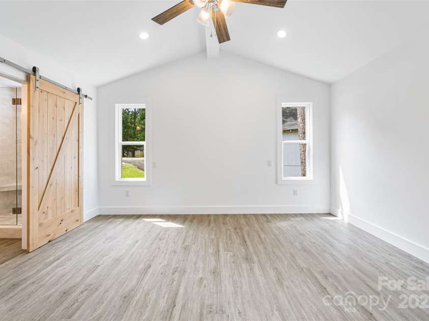 2027 Marquesas Avenue, Tega Cay, SC 29708.  MLS# CAR4262769, YatesRealty ID 28103. Primary Bedroom