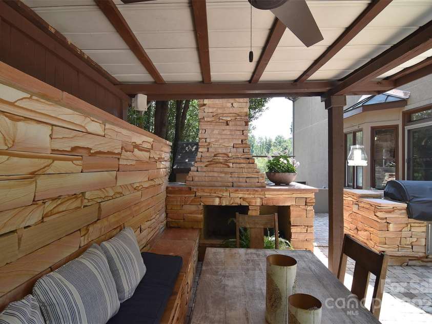 19641 Meta Road, Cornelius, NC 28031.  MLS# CAR4240880, YatesRealty ID 28105. Outdoor dining with fireeplace