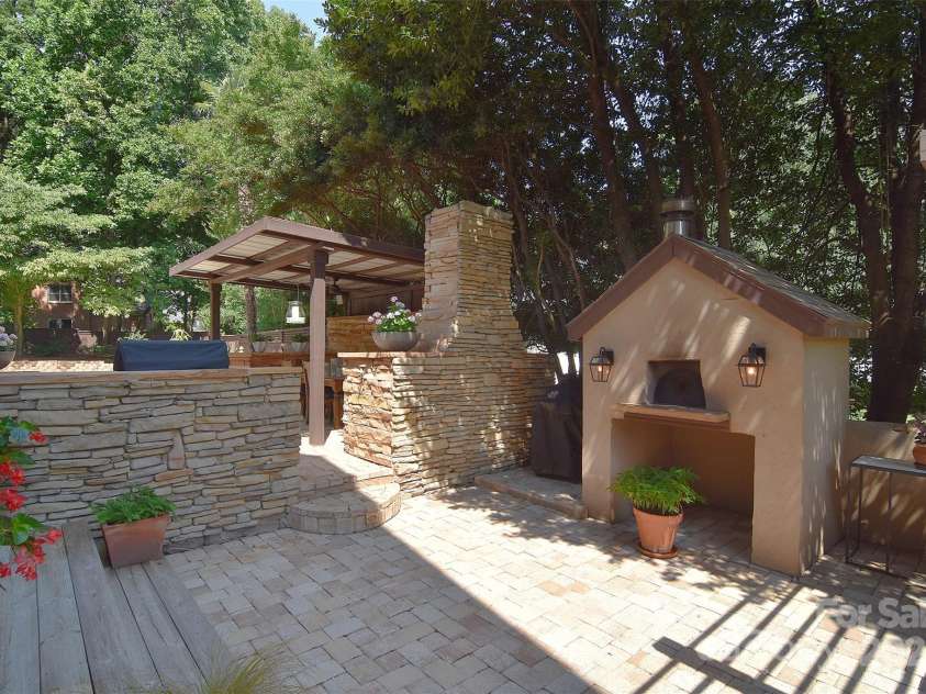 19641 Meta Road, Cornelius, NC 28031.  MLS# CAR4240880, YatesRealty ID 28105. Your own free standing pizza oven!