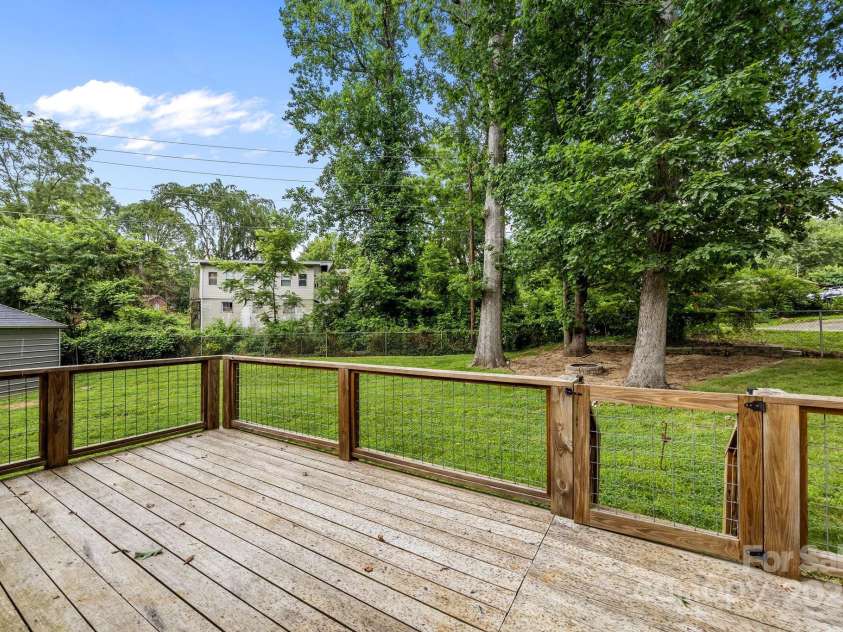 117 BeechTree Drive, Black Mountain, NC 28711.  MLS# CAR4281681, YatesRealty ID 28106. Amazing deck overlooking the backyard