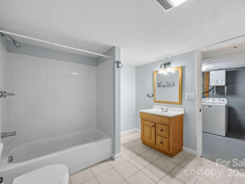 117 BeechTree Drive, Black Mountain, NC 28711.  MLS# CAR4281681, YatesRealty ID 28106. Downstairs bathroom