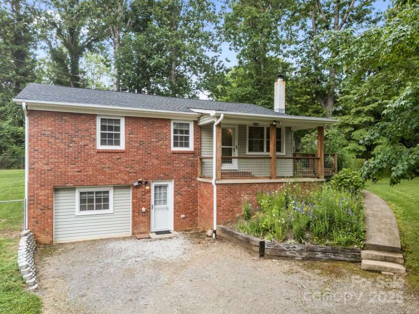 117 BeechTree Drive, Black Mountain, NC 28711.  MLS# CAR4281681, YatesRealty ID 28106. Driveway view of front of the home