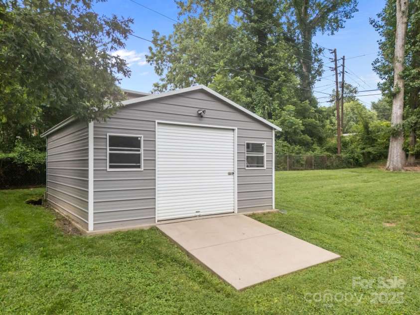 117 BeechTree Drive, Black Mountain, NC 28711.  MLS# CAR4281681, YatesRealty ID 28106. Fantastic oversize garage with electricity- many possibilities!