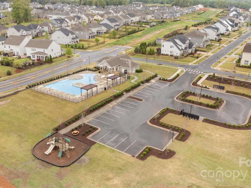 15230 Ravenall Drive, Huntersville, NC 28078.  MLS# CAR4243308, YatesRealty ID 28107. Community amenities including pool and playground