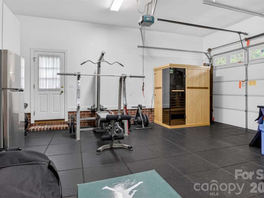 9533 Millen Drive, Harrisburg, NC 28075.  MLS# CAR4385489, YatesRealty ID 28108. Garage