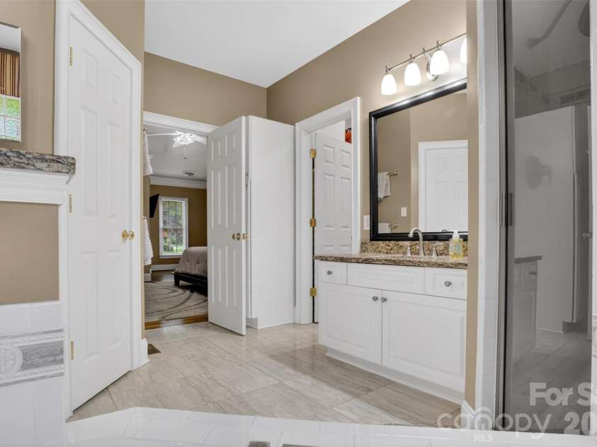 9533 Millen Drive, Harrisburg, NC 28075.  MLS# CAR4385489, YatesRealty ID 28108. Primary bathroom