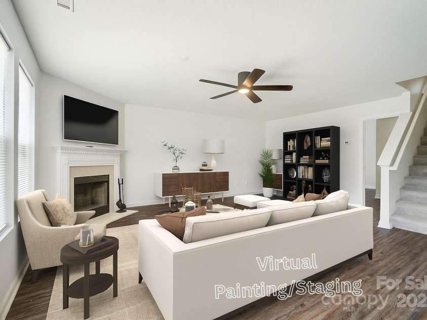 8604 Rockmoor Ridge Road, Charlotte, NC 28215.  MLS# CAR4268589, YatesRealty ID 28112. Family room is virtually painted and staged.
