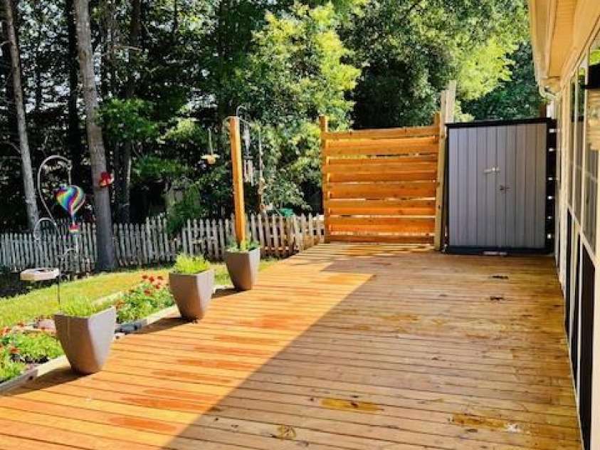 7215 Wingstone Lane, Charlotte, NC 28262.  MLS# CAR4274682, YatesRealty ID 28115. Backyard deck