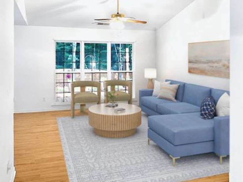 7215 Wingstone Lane, Charlotte, NC 28262.  MLS# CAR4274682, YatesRealty ID 28115. Virtually staged living room