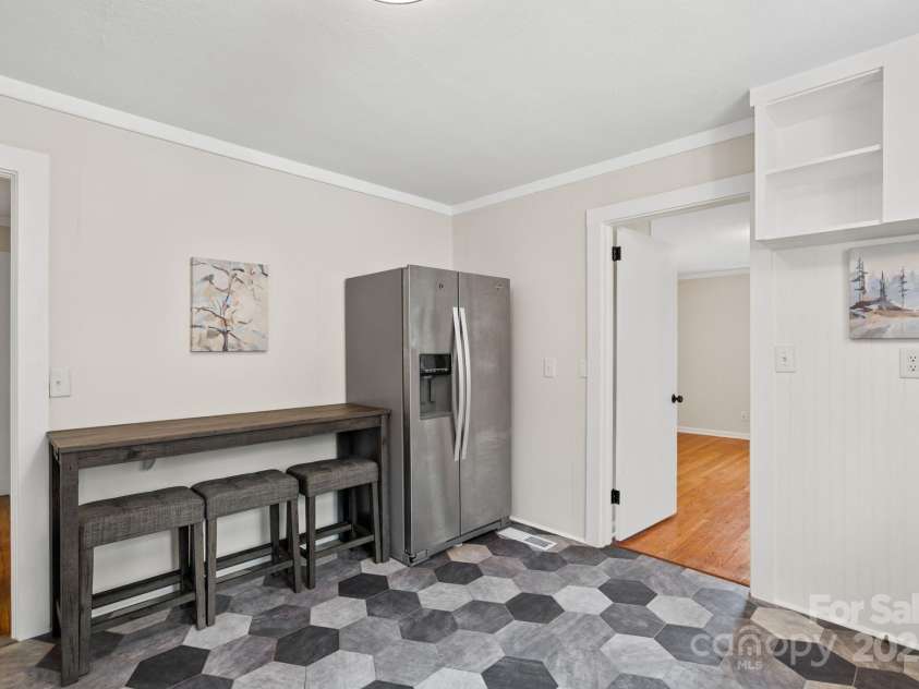 211 Woodland Road, Tryon, NC 28782.  MLS# CAR4274932, YatesRealty ID 28116. Kitchen, stainless appliances