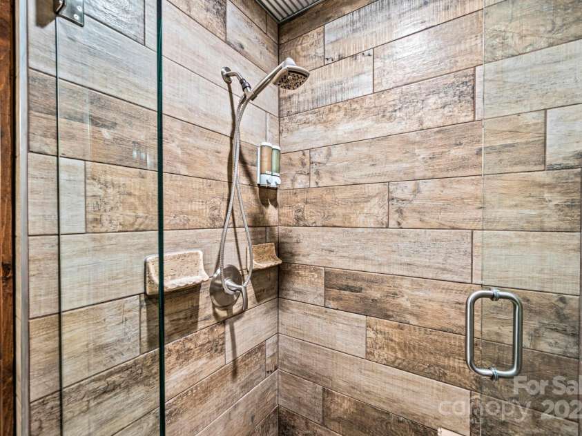 23 Hemlock Springs Road, Maggie Valley, NC 28751.  MLS# CAR4224375, YatesRealty ID 2812. Full bathroom on main