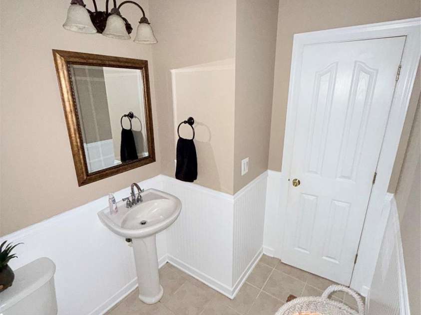 4819 Sandtyn Drive, Waxhaw, NC 28173.  MLS# CAR4282295, YatesRealty ID 28120. Downstairs half bath