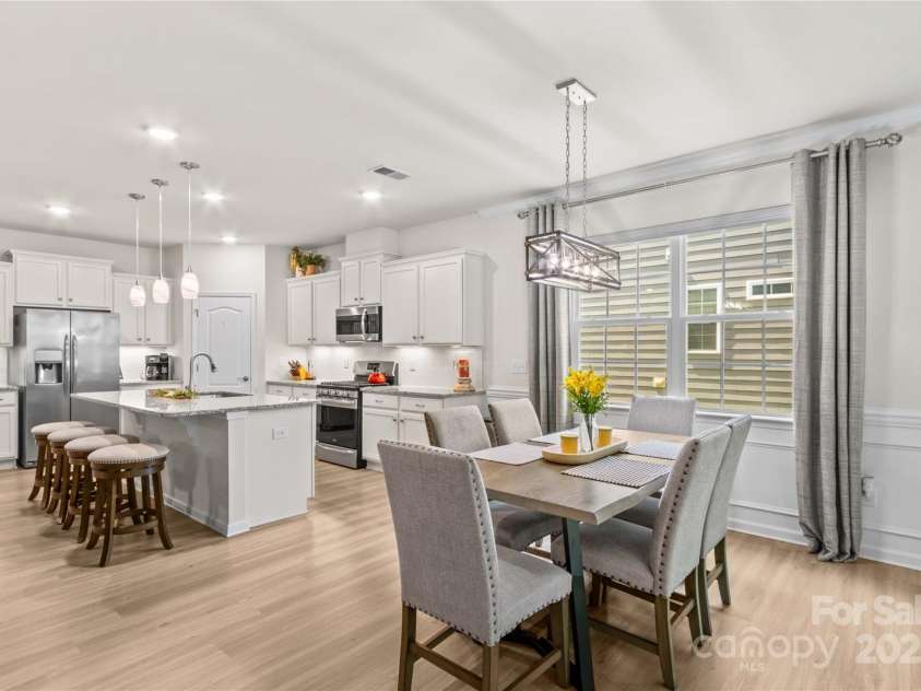 14036 Asbury Park Road, Huntersville, NC 28078.  MLS# CAR4283671, YatesRealty ID 28122. Dining with large bright windows