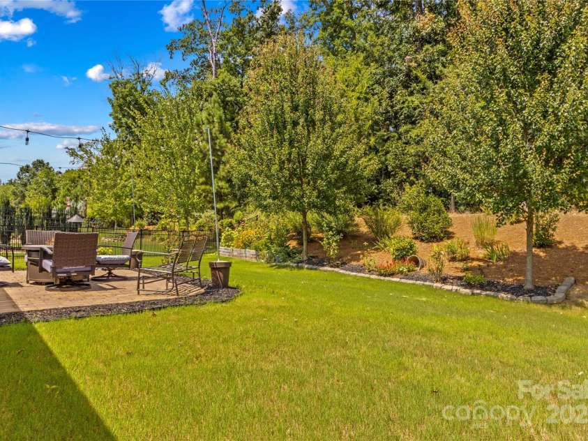 14036 Asbury Park Road, Huntersville, NC 28078.  MLS# CAR4283671, YatesRealty ID 28122. Large private porch, patio, and landscape back yard views