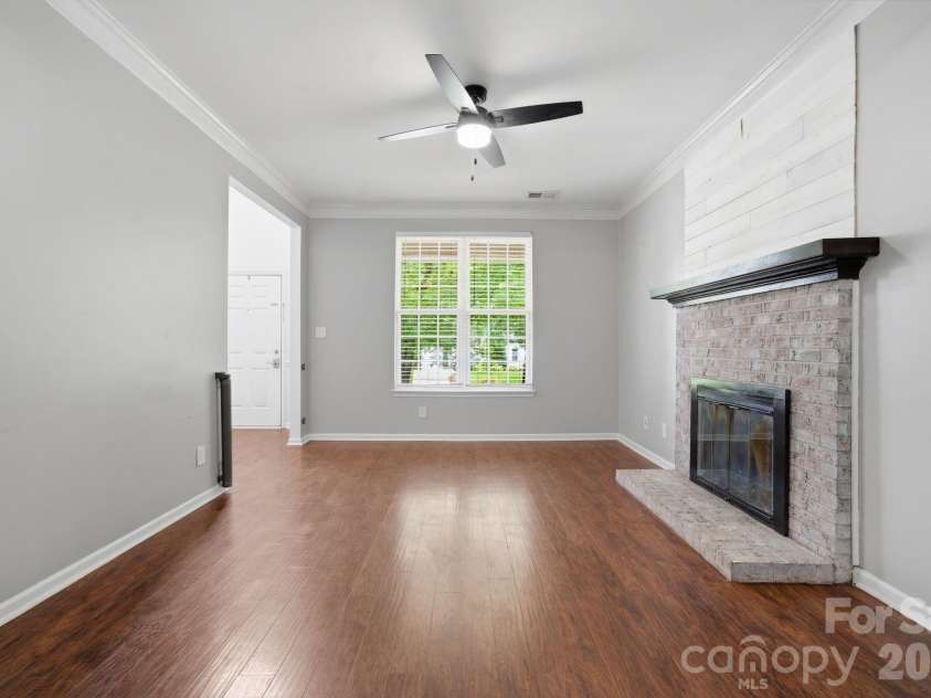 127 Citation Drive, Mooresville, NC 28117.  MLS# CAR4389366, YatesRealty ID 28127. Fireplace