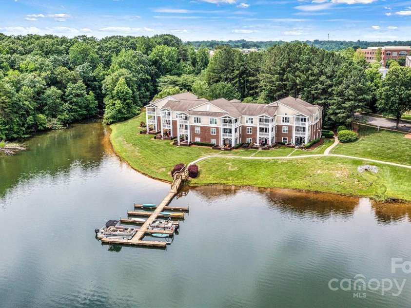 860 Jetton Street, Davidson, NC 28036.  MLS# CAR4269075, YatesRealty ID 28128. Beautiful Lake Davidson and view of building