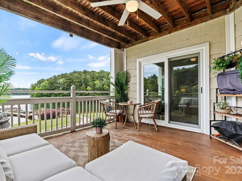 860 Jetton Street, Davidson, NC 28036.  MLS# CAR4269075, YatesRealty ID 28128. Covered porch with serene lake views
