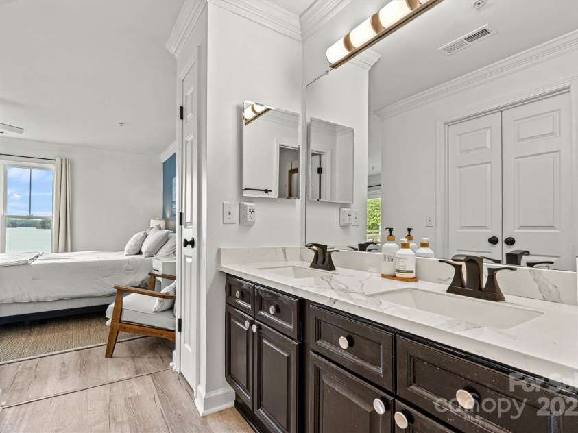 860 Jetton Street, Davidson, NC 28036.  MLS# CAR4269075, YatesRealty ID 28128. Primary bath/vanity