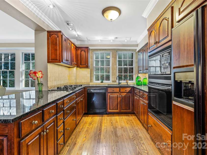 185 Macon Avenue, Asheville, NC 28804.  MLS# CAR4329475, YatesRealty ID 28133. Large kitchen with lots of cabinet space.