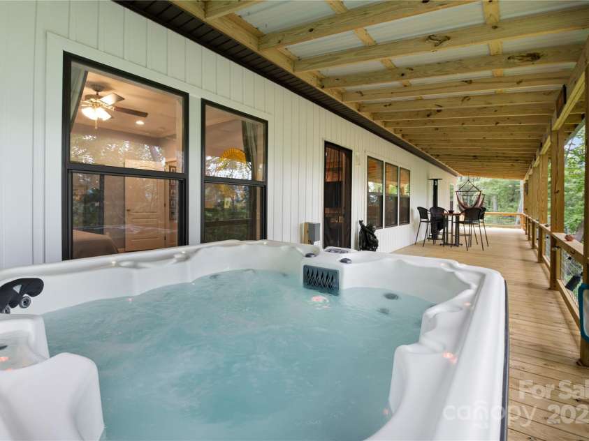 54 Bittersweet Trail, Canton, NC 28716.  MLS# CAR4271698, YatesRealty ID 28134. Imagine evenings in the hot tub, sipping your favorite beverage!