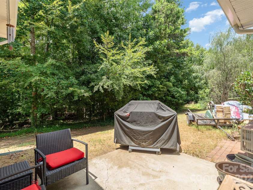 11907 Kimberfield Road, Matthews, NC 28105.  MLS# CAR4281213, YatesRealty ID 28137. Backyard Patio