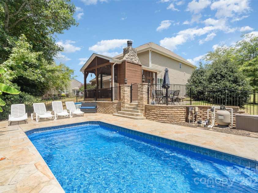11907 Kimberfield Road, Matthews, NC 28105.  MLS# CAR4281213, YatesRealty ID 28137. Backyard Pool