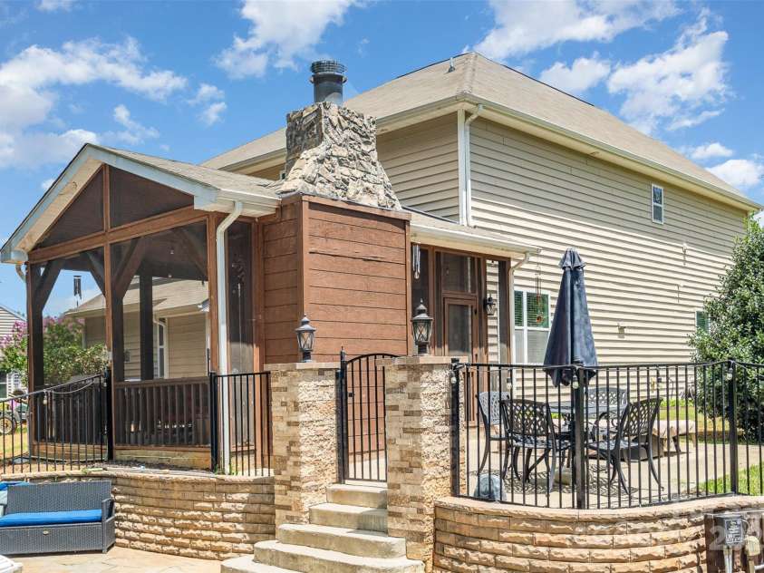 11907 Kimberfield Road, Matthews, NC 28105.  MLS# CAR4281213, YatesRealty ID 28137. Backyard porch & patio