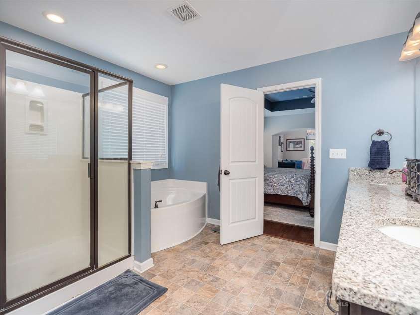 11907 Kimberfield Road, Matthews, NC 28105.  MLS# CAR4281213, YatesRealty ID 28137. Primary Bathroom