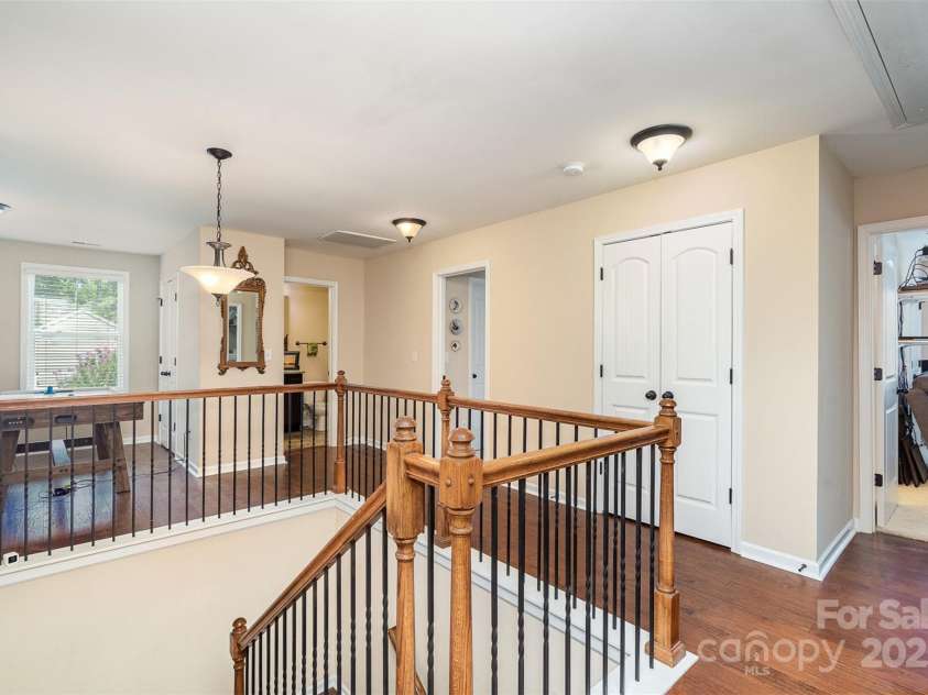 11907 Kimberfield Road, Matthews, NC 28105.  MLS# CAR4281213, YatesRealty ID 28137. Upstairs loft landing