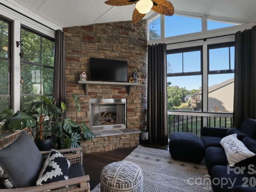 165 Morgans Branch Road, Belmont, NC 28012.  MLS# CAR4379357, YatesRealty ID 28140. Enclosed Screened Patio with Fireplace