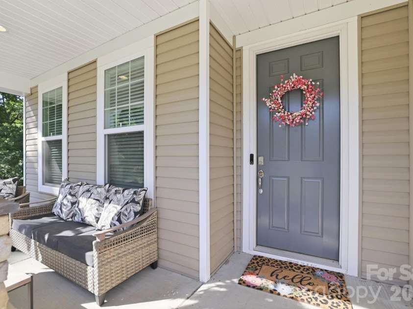 165 Morgans Branch Road, Belmont, NC 28012.  MLS# CAR4379357, YatesRealty ID 28140. Gorgeous Front porch