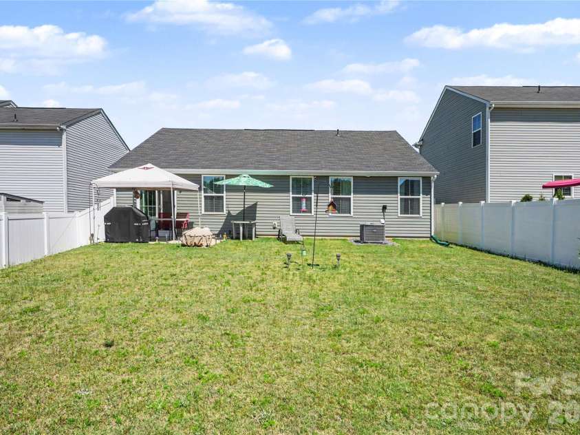 114 Weymouth Avenue, Troutman, NC 28166.  MLS# CAR4380264, YatesRealty ID 28141. Backyard 