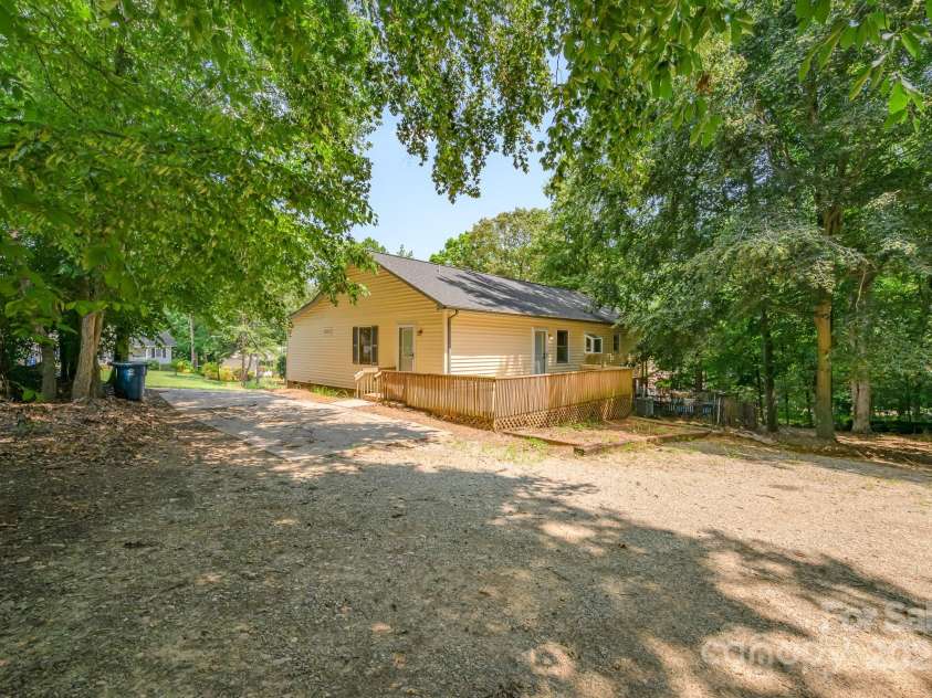 103 Sycamore Road, Salisbury, NC 28147.  MLS# CAR4265869, YatesRealty ID 28144. Back of home with large deck