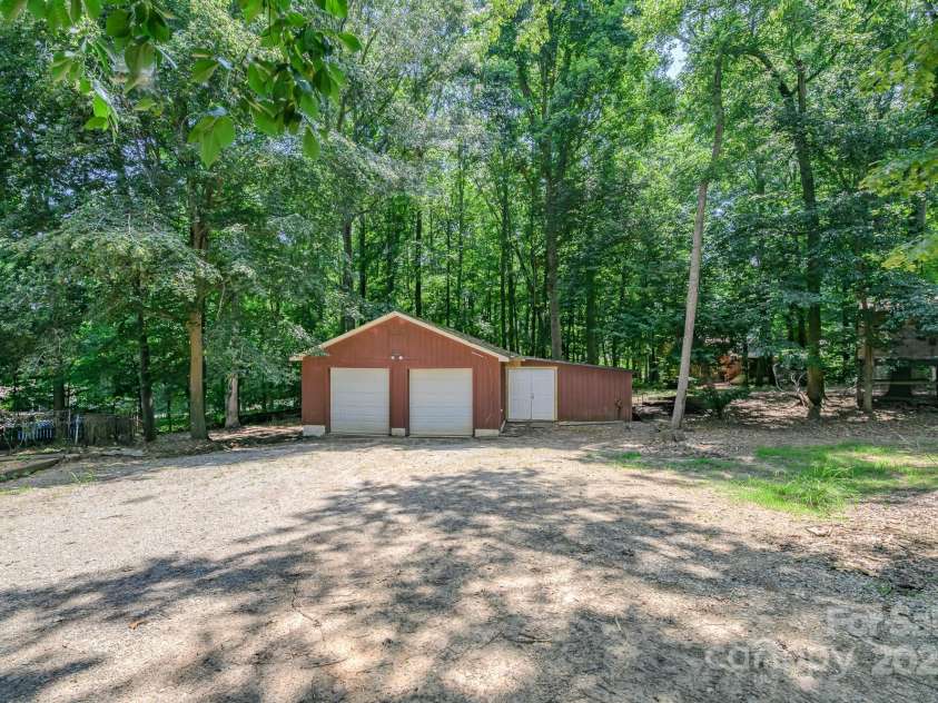103 Sycamore Road, Salisbury, NC 28147.  MLS# CAR4265869, YatesRealty ID 28144. Driveway coming into garage