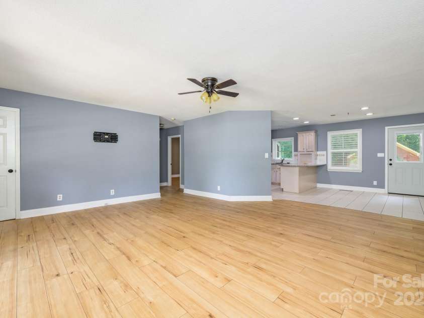 103 Sycamore Road, Salisbury, NC 28147.  MLS# CAR4265869, YatesRealty ID 28144. Living room looking into kitchen and dining room.