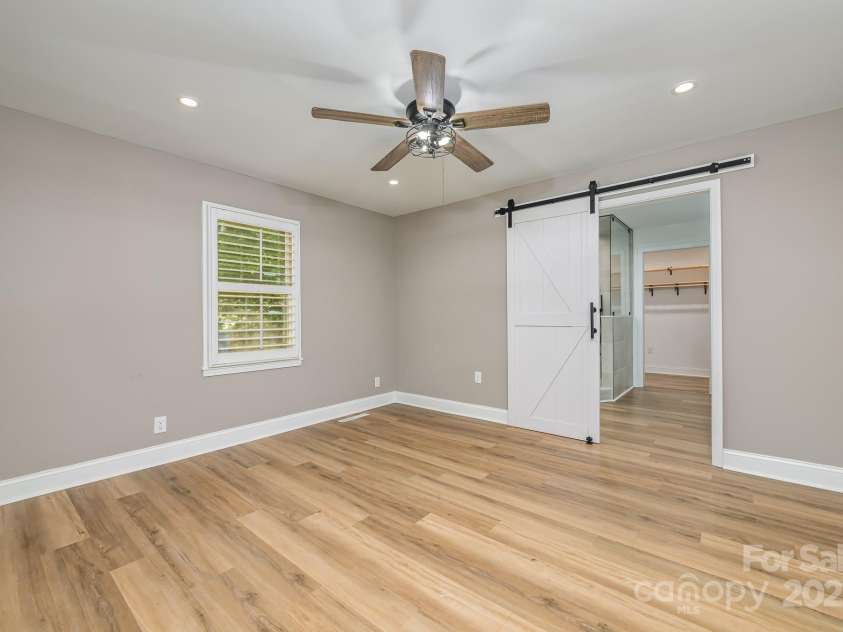 103 Sycamore Road, Salisbury, NC 28147.  MLS# CAR4265869, YatesRealty ID 28144. Master bedroom with barn door going into master bath