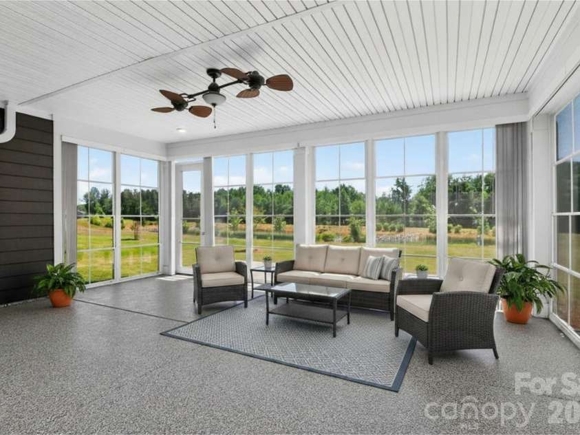 4122 Moxie Way, Charlotte, NC 28215.  MLS# CAR4384032, YatesRealty ID 28145. Large 4 Seasons Room w/ Mini-Split (digitally staged)