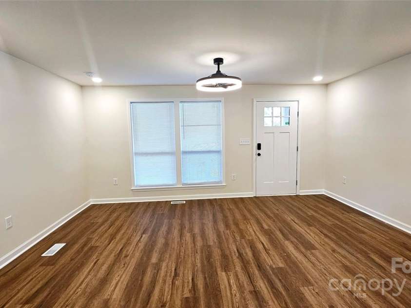 703 Central Drive, Concord, NC 28027.  MLS# CAR4272238, YatesRealty ID 28145. Living Room