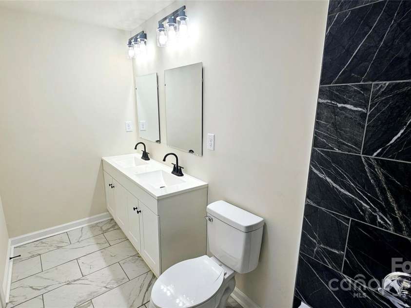 703 Central Drive, Concord, NC 28027.  MLS# CAR4272238, YatesRealty ID 28145. Primary Bathroom