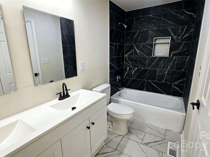 703 Central Drive, Concord, NC 28027.  MLS# CAR4272238, YatesRealty ID 28145. Primary Bathroom