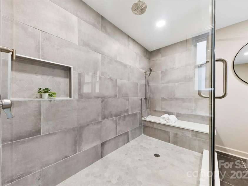 3661 Annlin Avenue, Charlotte, NC 28209.  MLS# CAR4259682, YatesRealty ID 28146. Primary bathroom shower