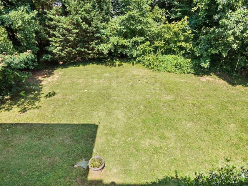 5807 Mctaggart Lane, Charlotte, NC 28269.  MLS# CAR4237626, YatesRealty ID 28147. 