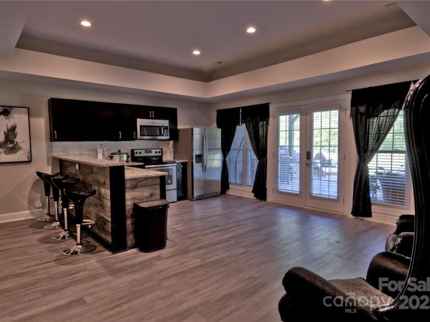 143 Gibbs Road, Mooresville, NC 28117.  MLS# CAR4244508, YatesRealty ID 28148. Basement kitchen
