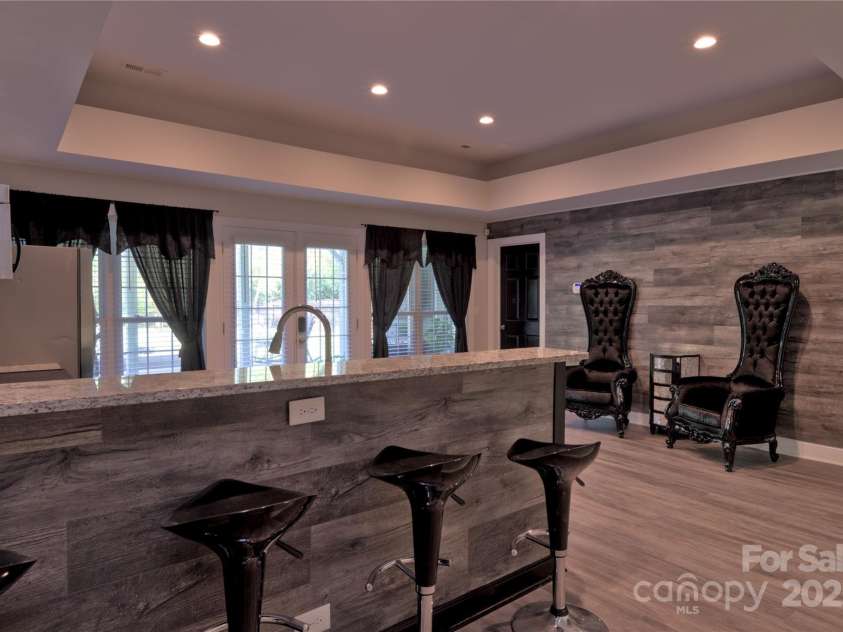 143 Gibbs Road, Mooresville, NC 28117.  MLS# CAR4244508, YatesRealty ID 28148. Basement kitchen