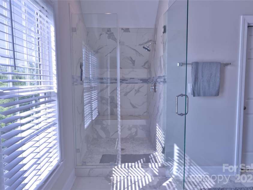143 Gibbs Road, Mooresville, NC 28117.  MLS# CAR4244508, YatesRealty ID 28148. Custom tile shower en suite